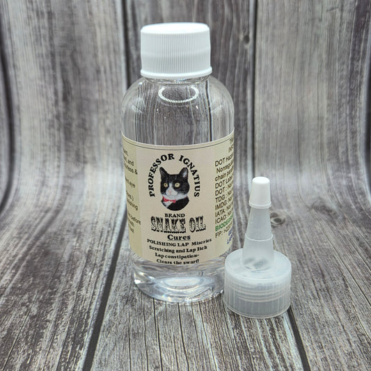 Bottle of Professor Ignatius Brand Snake Oil™ with separate applicator nozzle