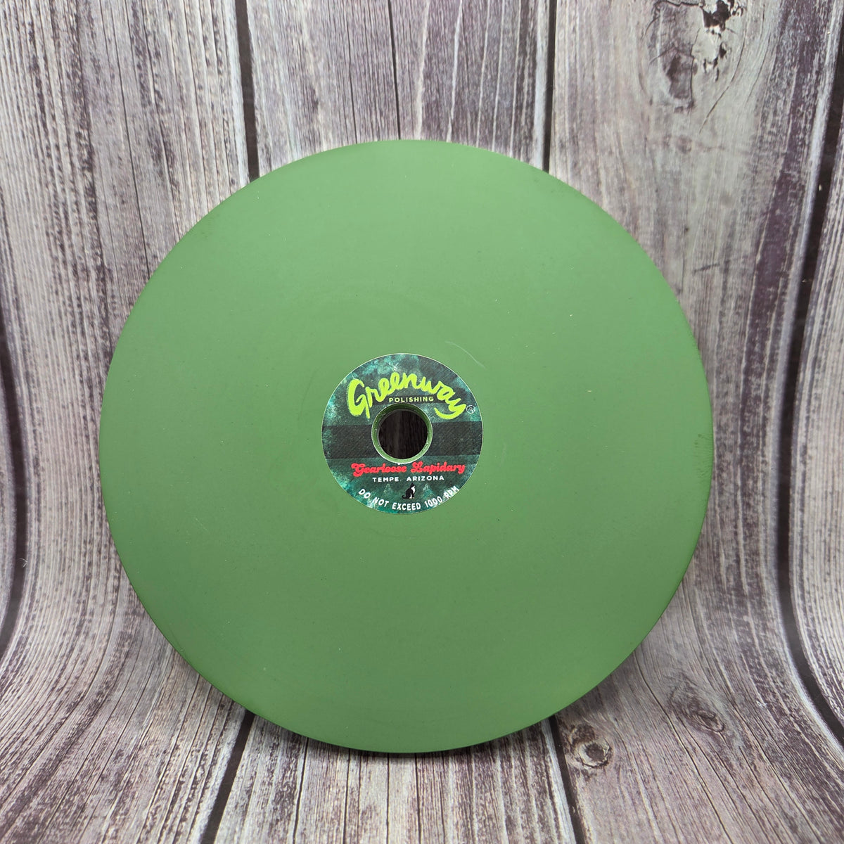 Green GREENWAY™ chromium-oxide composite faceting lap viewed from above