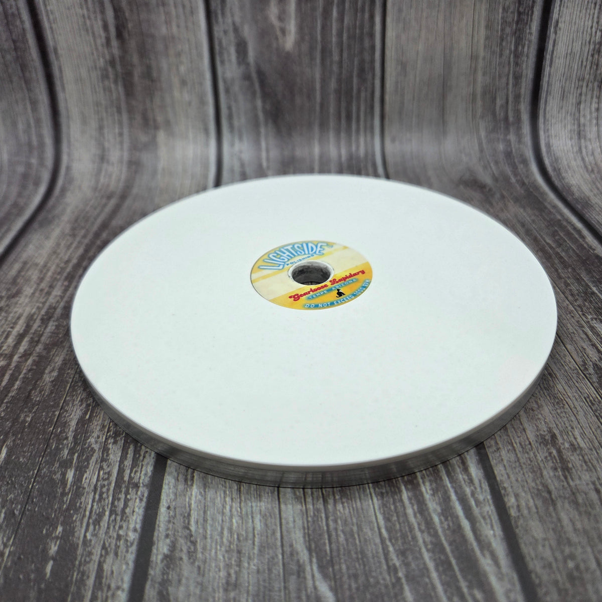 LIGHTSIDE™ composite faceting lap shown at an angle