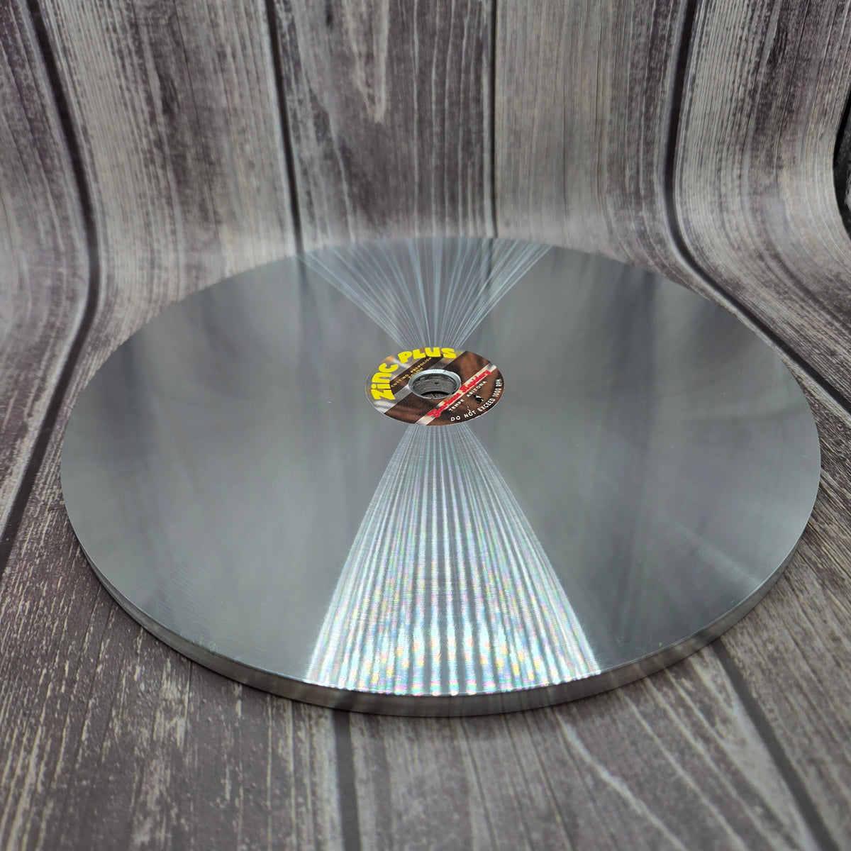 ZINC PLUS™ zinc prepolish lap shown at an angle