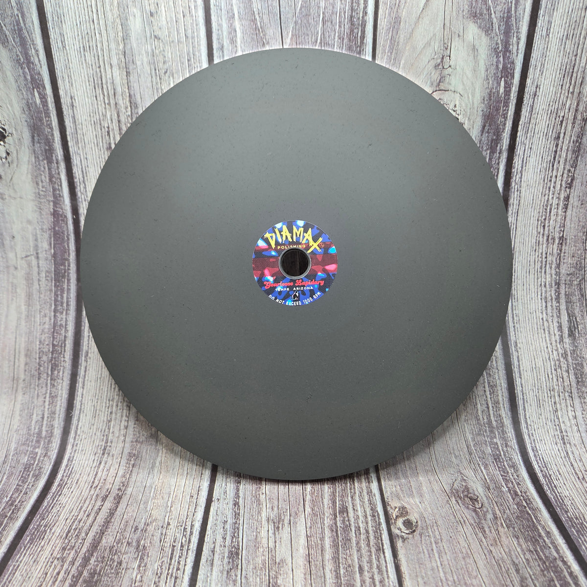 Gray DIAMAX™ composite faceting lap viewed from above